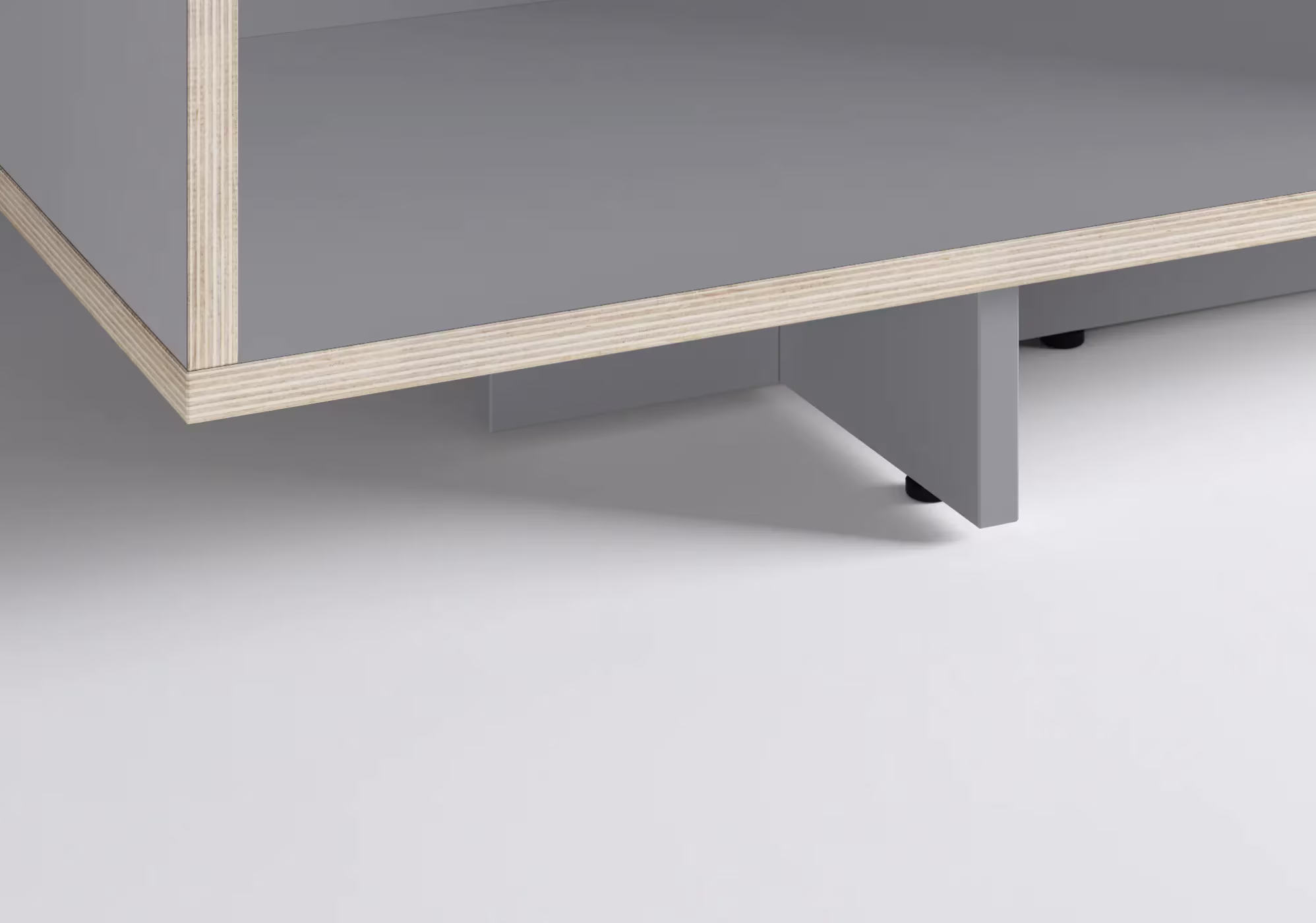 A bedside table in a furnished room