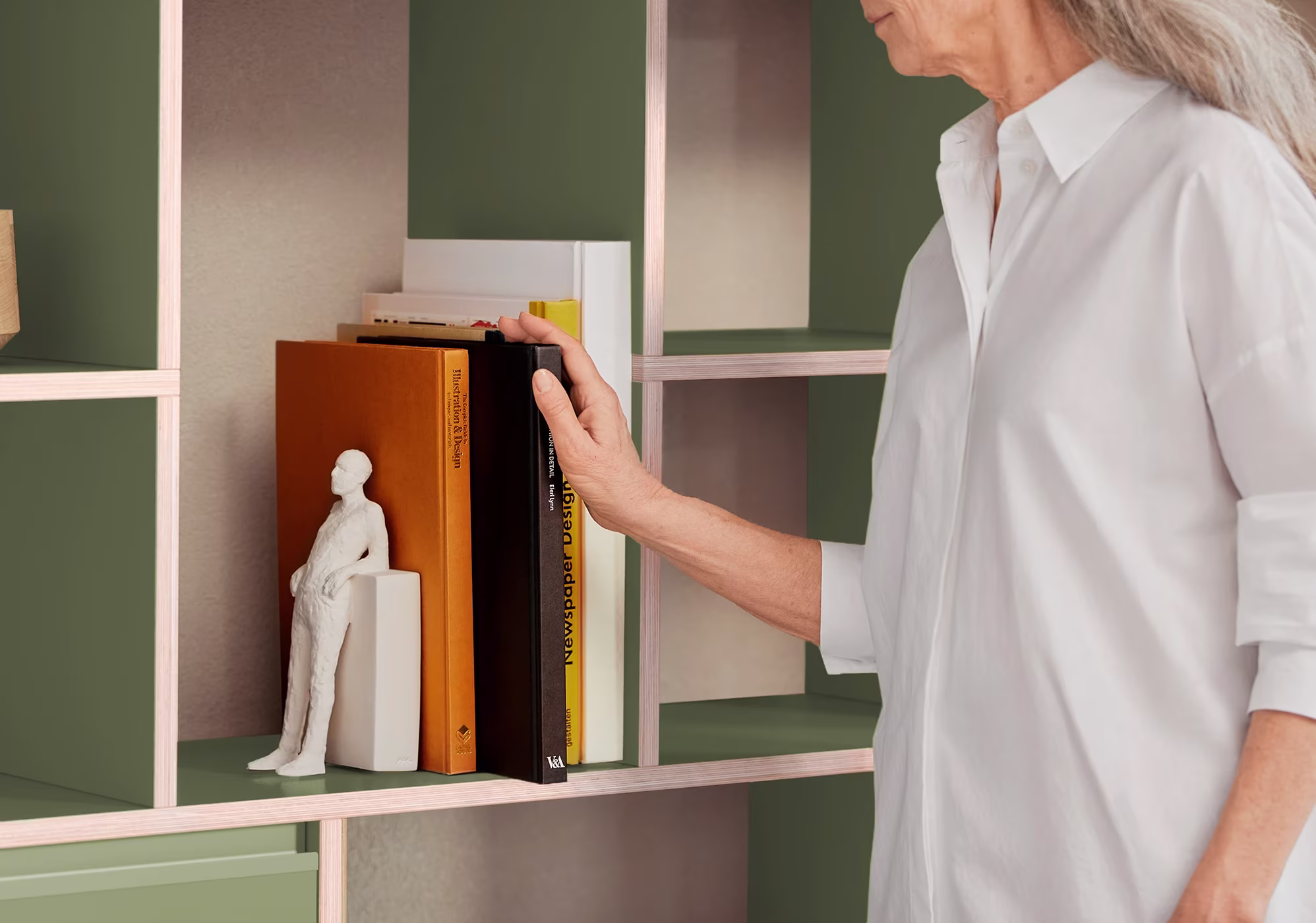 A close view of two shelves and the visible board edge